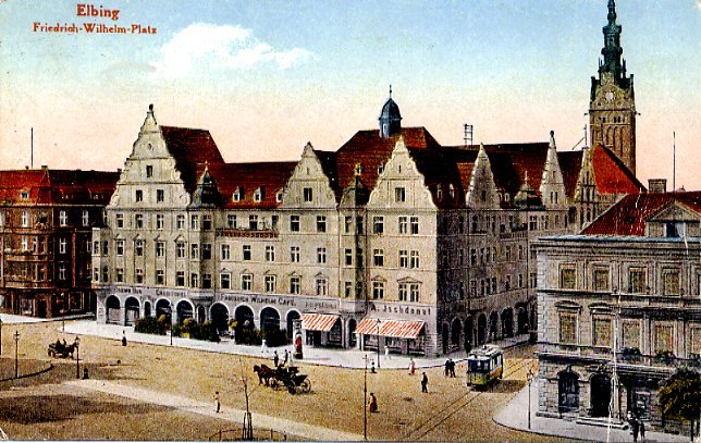 Elbląg, Tramwaj i dorożki na pl. Fryderyka Wilhelma (obecnie. pl. Słowiański) Elbląg, Tramwaj i dorożki na pl. Fryderyka Wilhelma (obecnie. pl. Słowiański)
