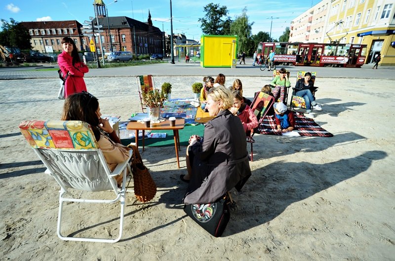 Elbląg, Tak też można - z dywanikiem, kocem i roślinami Elbląg, Tak też można - z dywanikiem, kocem i roślinami
