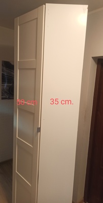 Elbląg SZAFA NAROŻNA IKEA - biała. Wymiary: drzwi 50 cm. Bok 35 cm. Tył 52 cm. Wysoka 200 cm.