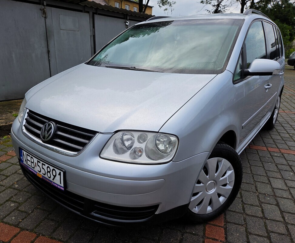 Elbląg 🚗 Volkswagen Touran 1.9 TDI 110KM 2004 – Zwinne, Miejskie Autko Rodzinne z Bogatym Wyposażeniem!