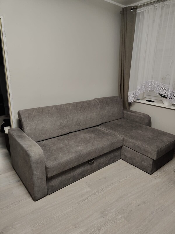 Elbląg Sprzedam narożnik z funkcją spania, kolor szary, kupiony około roku temu u prywatnego sprzedawcy na zamówienie.