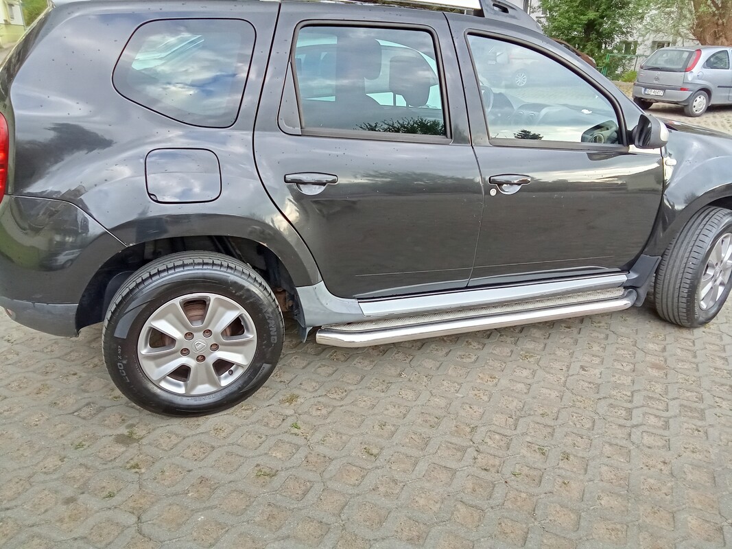 Elbląg Sprzedam: zadbana Dacia Duster SUV w kolorze czarnym, r. prod.2014,benzyna + LPG. Model Dacia Duster 13-Duster