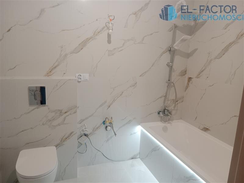 Elbląg EL-FACTOR Nieruchomości — jasne mieszkanie 57,83 m² z dużym balkonem w Elblągu Grunwaldzka | Nowe