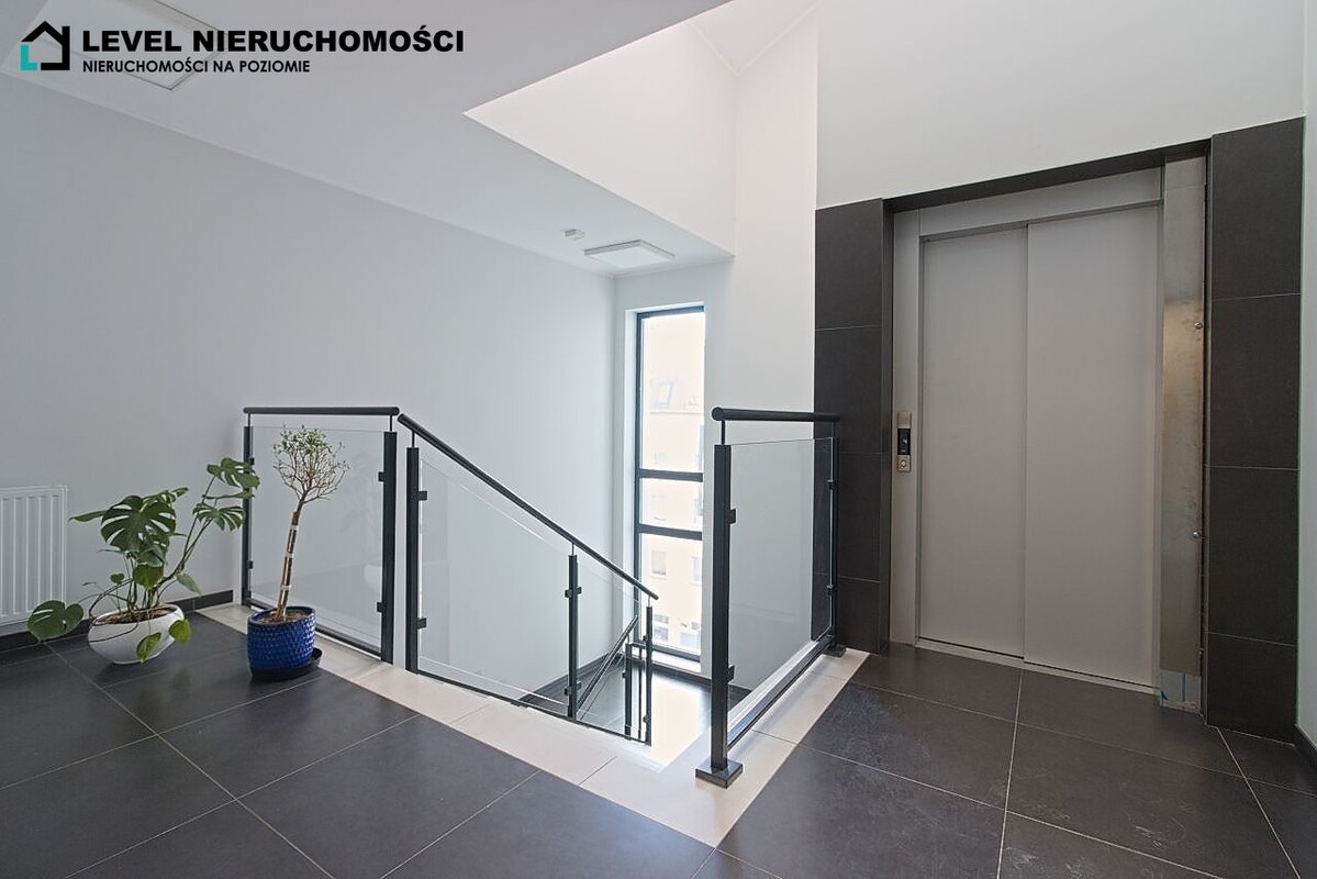 Elbląg LEVEL NIERUCHOMOŚCIDwupoziomowy apartament z tarasemul. Stary RynekNIERUCHOMOŚCI NA POZIOMIE