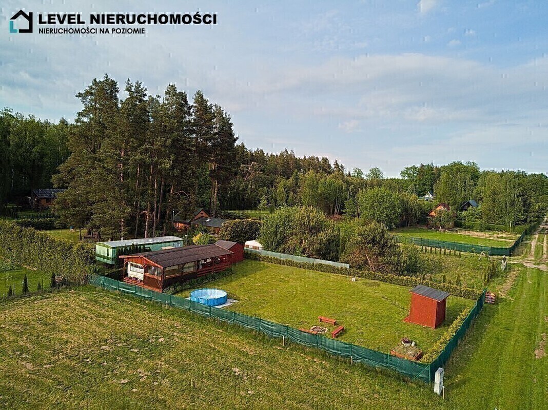 Elbląg LEVEL NIERUCHOMOŚCI Działka nad jeiorem z domkiem Szymonowo NIERUCHOMOŚCINA POZIOMIE