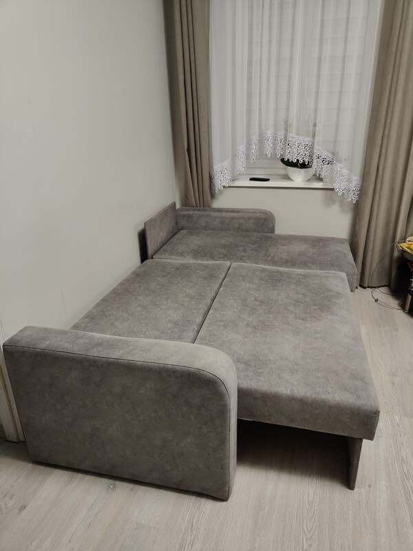 Elbląg Sprzedam narożnik z funkcją spania, kolor szary, kupiony około roku temu u prywatnego sprzedawcy na zamówienie.