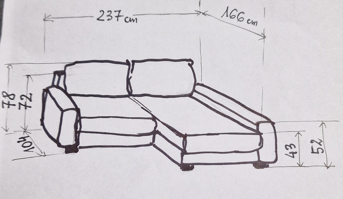 Elbląg Lewy kompaktowy narożnik PICOLLO z funkcją spania z przyjemnej tkaniny w kolorze ciemnej, zgaszonej zieleni.