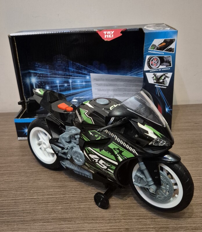 Elbląg Motocykl zabawka z efektami świetlnymi i dźwiękowymi oraz po naciśnięciu przycisku sam jedzie do przodu. Stan