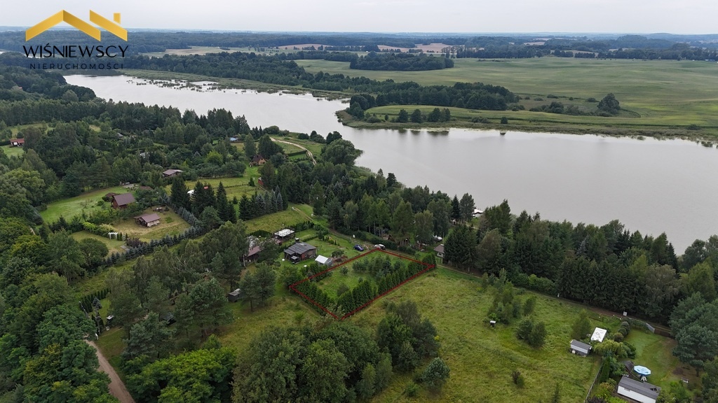 Elbląg WIŚNIEWSCY NIERUCHOMOŚCI Sp. z o.o.Sprzedam działkę - Sambród. Oferta: Sprzedaż wyjątkowej działki nad jeziorem