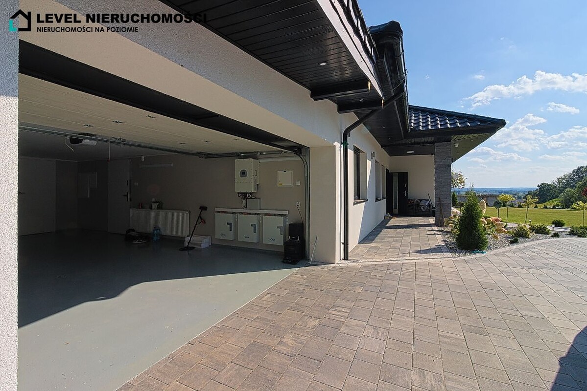 Elbląg LEVEL NIERUCHOMOŚCI Nowoczesny dom pod ElblągiemMyślęcin259,10 m2 NIERUCHOMOŚCI NA POZIOMIE