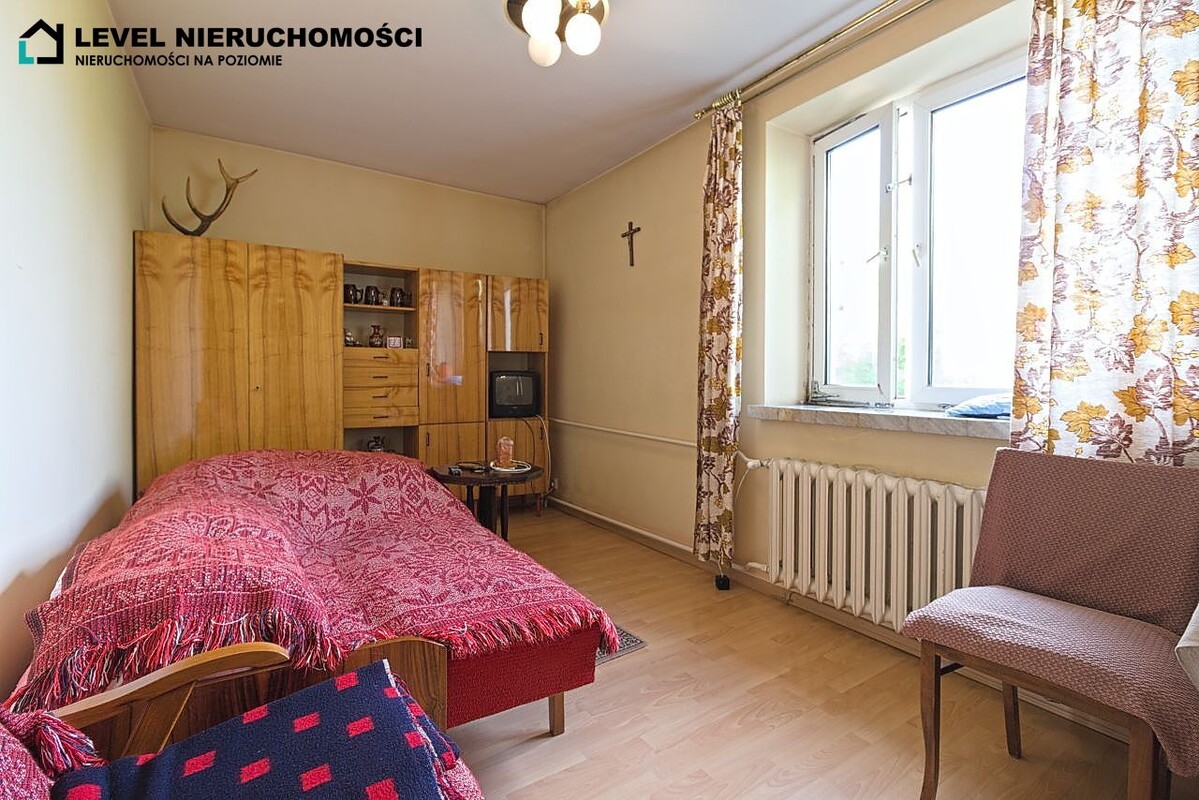 Elbląg LEVEL NIERUCHOMOŚCI Dom na dużej działce w Elbląguplus dwa garażeul. Freta NIERUCHOMOŚCI NA POZIOMIE