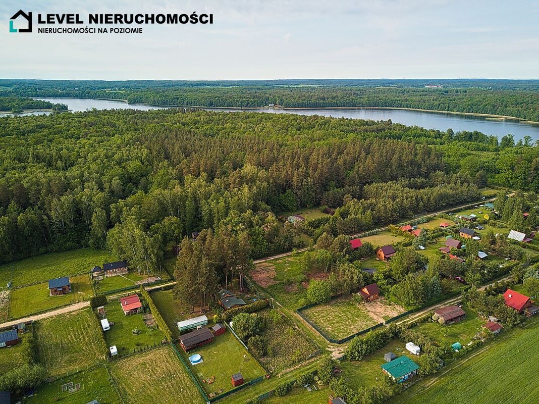 Elbląg LEVEL NIERUCHOMOŚCI Działka nad jeiorem z domkiem Szymonowo NIERUCHOMOŚCINA POZIOMIE