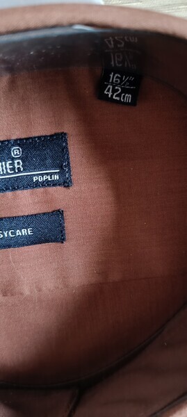 Elbląg Nowa koszula męska, rozm ok. XL, brązowa, na krótki rękaw. Cena 20 zl. Dlugosc 70 cm, szerokość 61 cm