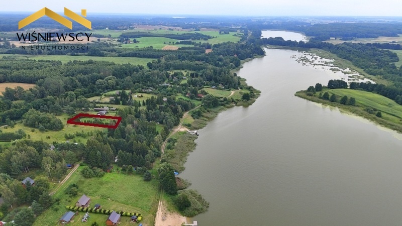 Elbląg WIŚNIEWSCY NIERUCHOMOŚCI Sp. z o.o.Sprzedam działkę - Sambród. Oferta: Sprzedaż wyjątkowej działki nad jeziorem
