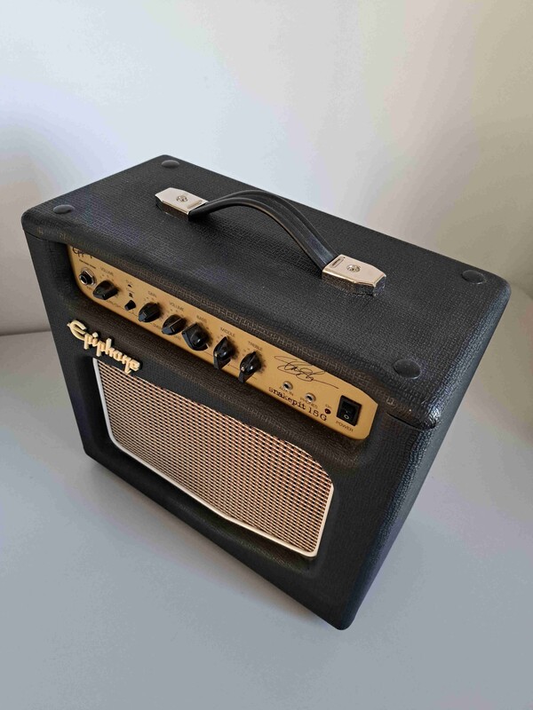 Elbląg Wzmacniacz / Combo gitarowe - Epiphone Snakepit 15G.
Wzmacniacz gitarowy typu combo o mocy 15W, przeznaczony