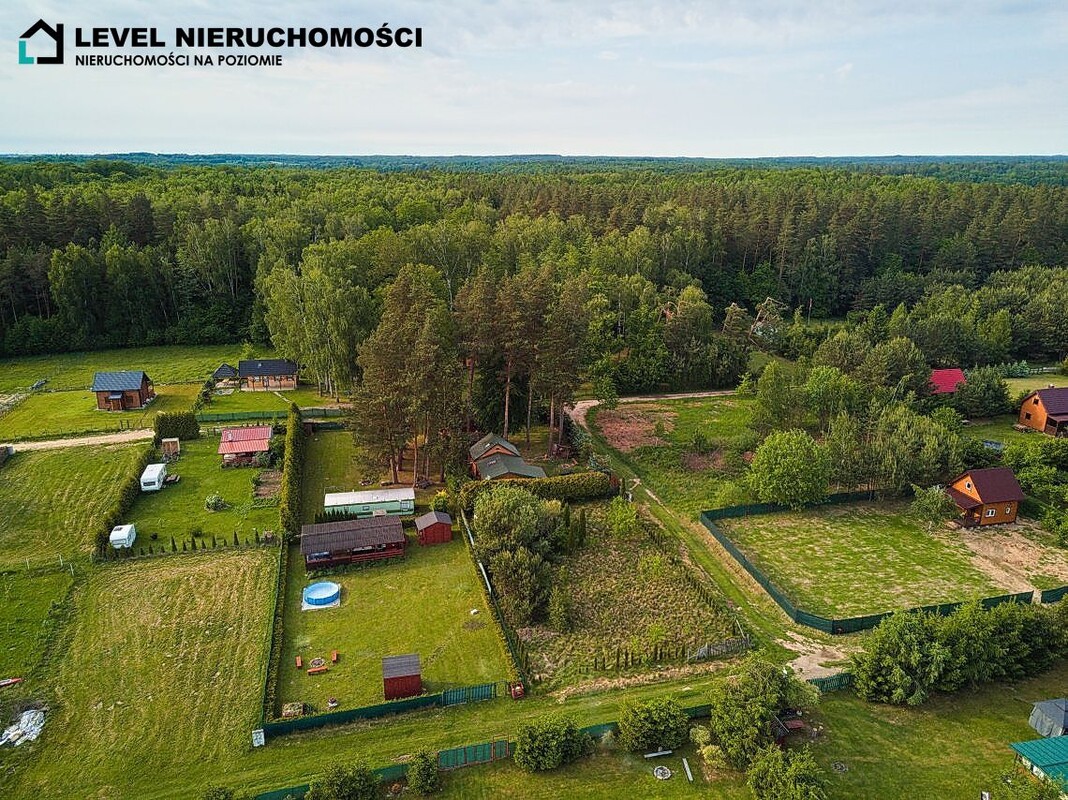 Elbląg LEVEL NIERUCHOMOŚCI Działka nad jeiorem z domkiem Szymonowo NIERUCHOMOŚCINA POZIOMIE