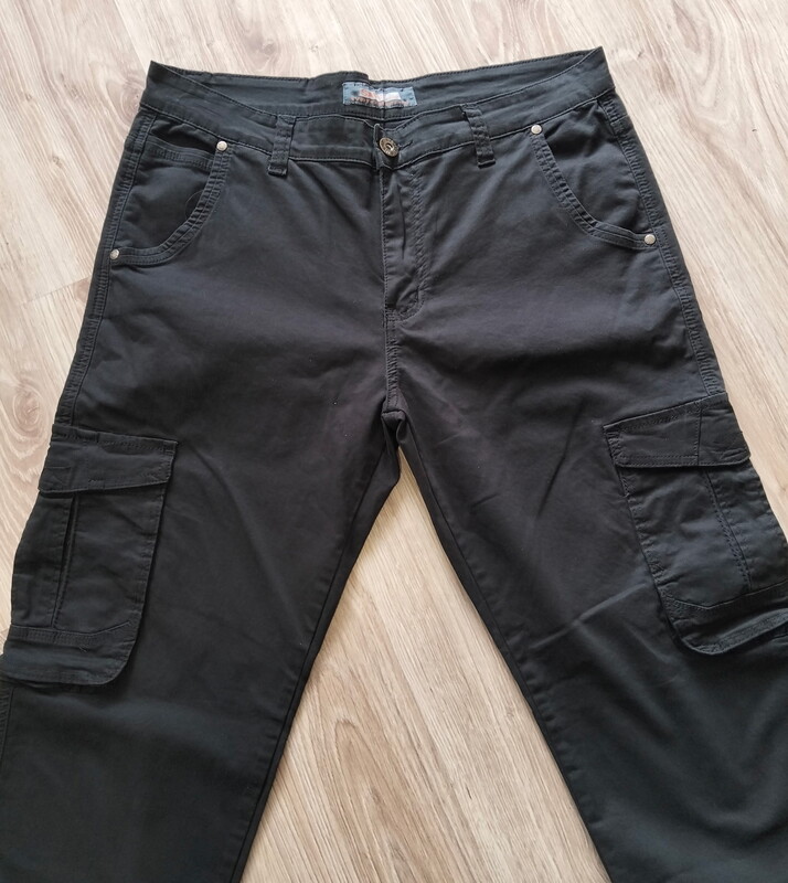 Elbląg Męska kurtka skórzana firmy Volcano L dł. 70cm. obw. 125cm. wzr. 180cm. Spodnie Sav'il Jeans W32 L34