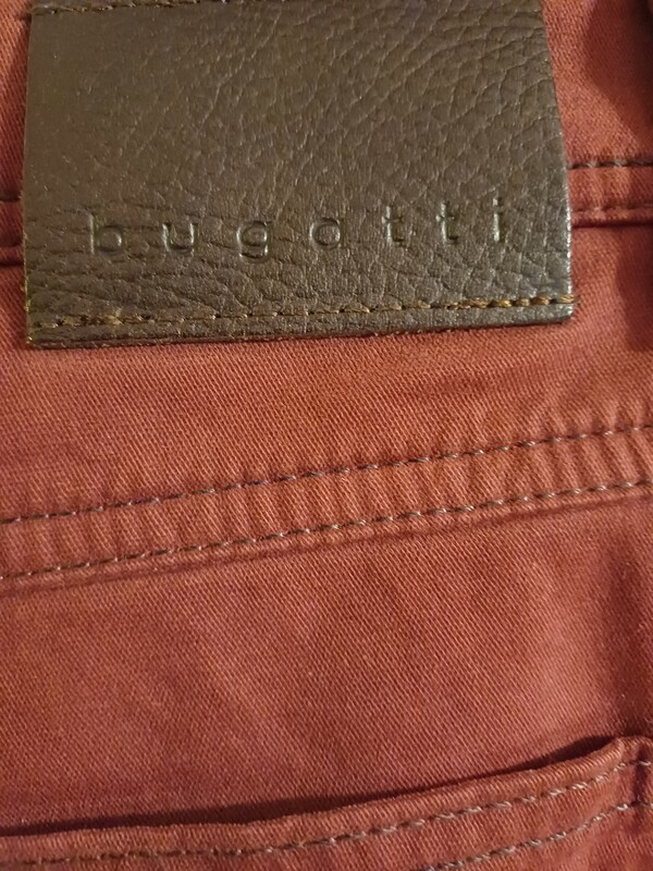 Elbląg Spodnie męskie BUGATTI rozmiar 34 32 wymiary pas 2x44 długość 108 miękki materiał ocieplane, logowane guziki