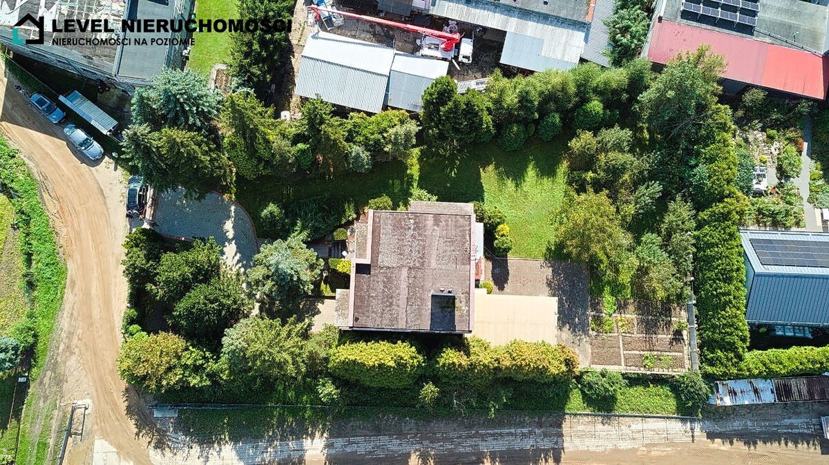 Elbląg LEVEL NIERUCHOMOŚCI Dom na dużej działce w Elbląguplus dwa garażeul. Freta NIERUCHOMOŚCI NA POZIOMIE