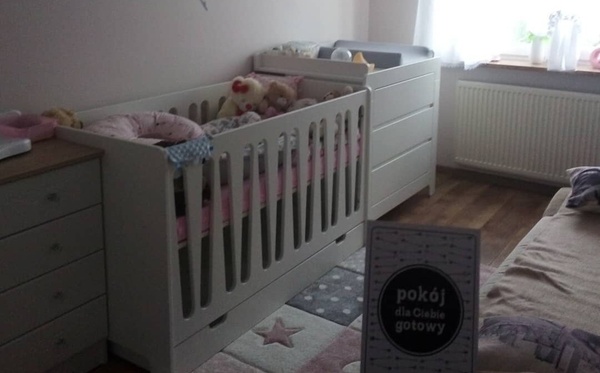 Elbląg Sprzedam łóżeczko dziecięce 140x70 wraz z materacem. Posiada ślady użytkowania.
Bok łóżka tzw szczebelki