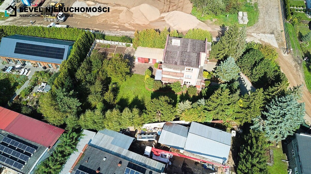 Elbląg LEVEL NIERUCHOMOŚCI Dom na dużej działce w Elbląguplus dwa garażeul. Freta NIERUCHOMOŚCI NA POZIOMIE