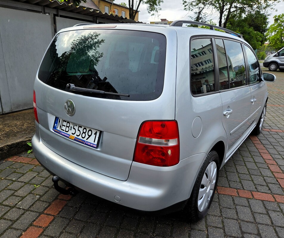 Elbląg 🚗 Volkswagen Touran 1.9 TDI 110KM 2004 – Zwinne, Miejskie Autko Rodzinne z Bogatym Wyposażeniem!