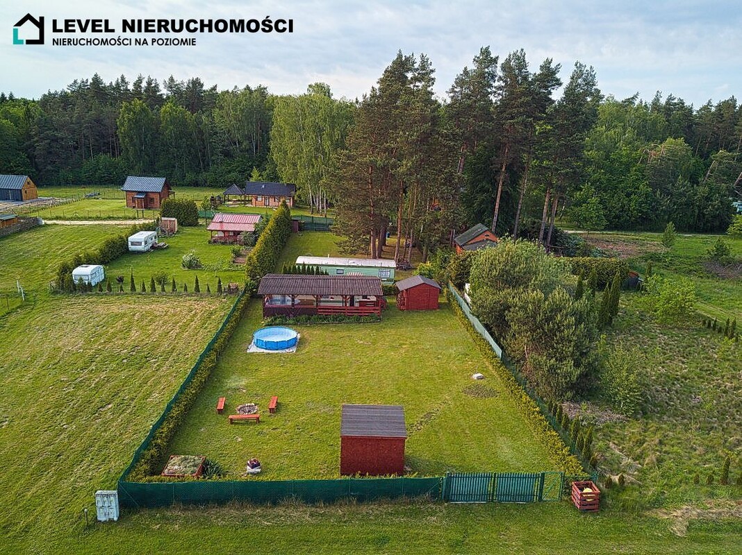 Elbląg LEVEL NIERUCHOMOŚCI Działka nad jeiorem z domkiem Szymonowo NIERUCHOMOŚCINA POZIOMIE