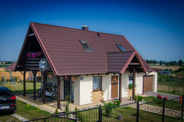 Elbląg DOM DREWNIANY JEDNORODZINNY ECOHOUSE I-Z GARAŻEMJesteśmy firmą zajmującą się produkcją domów drewnianych