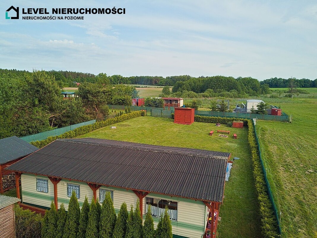 Elbląg LEVEL NIERUCHOMOŚCI Działka nad jeiorem z domkiem Szymonowo NIERUCHOMOŚCINA POZIOMIE