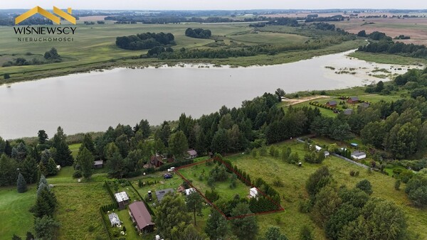 Elbląg WIŚNIEWSCY NIERUCHOMOŚCI Sp. z o.o.Sprzedam działkę - Sambród. Oferta: Sprzedaż wyjątkowej działki nad jeziorem