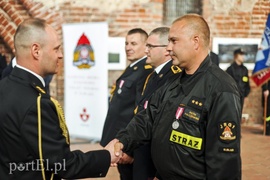 Święty Florian przyniósł strażakom awanse i odznaczenia