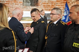 Święty Florian przyniósł strażakom awanse i odznaczenia